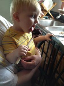 Kiddo enjoying some yummy chocolate fudge!